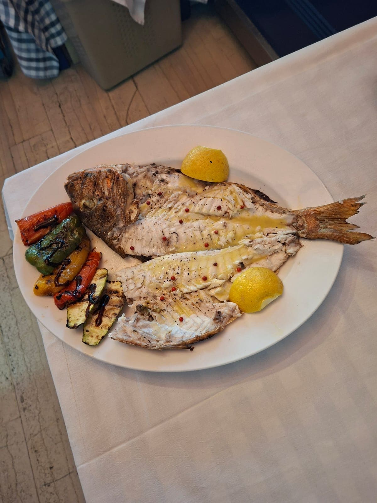 Grilled sea bream, filleted, with grilled vegetables